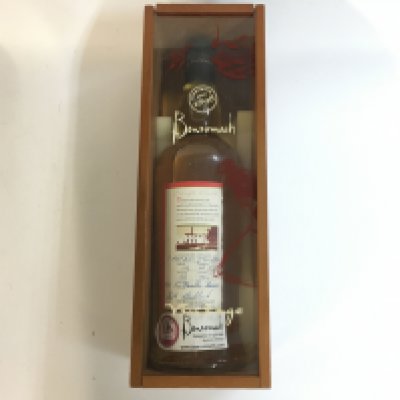 A limited edition single malt Benromach whiskey with a hand written label, bottled on 2/12/2007 distilled 1/5/2000 bottle number 172 7 years old when bottled, in a fitted case