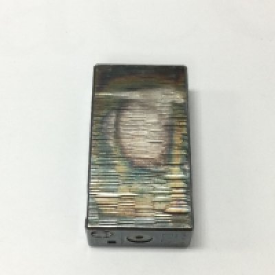 A vintage Vinci Paris lighter with nice patina.Postage A No reserve