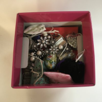 A box of various costume jewellery