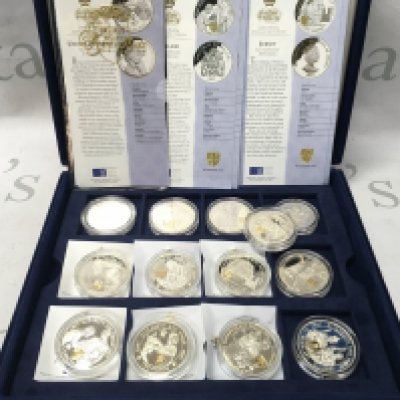 A collection of sterling silver proof coins commemorating the golden wedding anniversary. Postage B