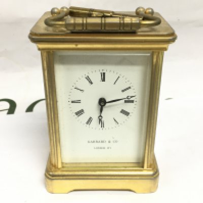 A brass cased garrard and Co carriage clock.