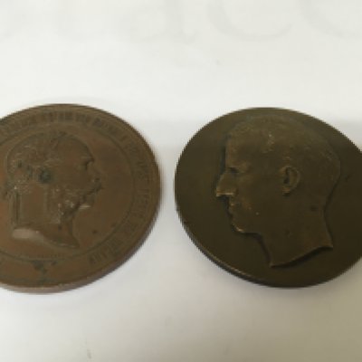 An Austrian Vienna 1873 International Exhibition bronze medal with profile of Emperor Franz Joseph. With one other Belgium bronze medallion (2)
