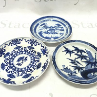 A Collection of Chinese blue and white dishes with floral and temple designs. Approximately 20cm wide. This lot cannot be posted