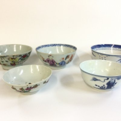 Five Chinese bowls including blue and white and Famille rose examples . Approximately 4-5&#2013266057۝ wide.