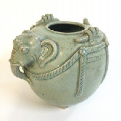 A Chinese celadon elephant shaped vase censer , approximately 16Cm tall.