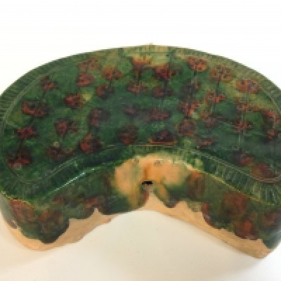 Chinese Samcai glazed terracotta pillow, Tang Dynasty style . 20cm wide, 6cm tall.
