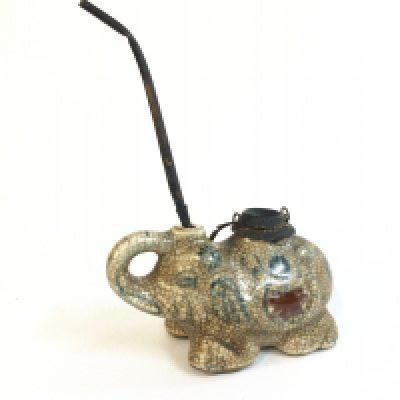 A Chinese crackle glazed porcelain elephant opium smoking pipe . Dimensions 9cm tall 15cm long approximately