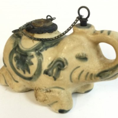 A Chinese porcelain elephant opium smoking pipe 15cm long 10cm tall approximately
