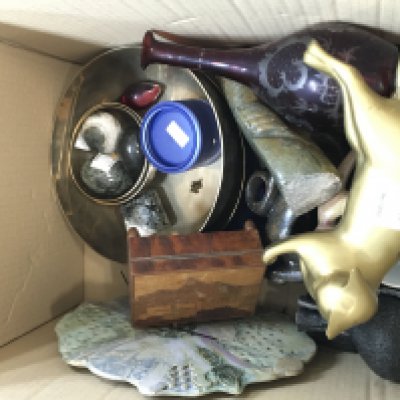 A Collection of assorted items including a brass cat, cranberry vase, wooden music box, contemporary art pieces, steel 24 carat gold plated reflections of a reign coin collection. This lot cannot be posted