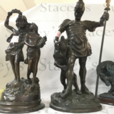 4 Bronze figurine sculptures which are vintage soldiers and characters.