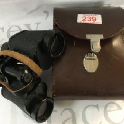 Records (7 inch singles), clock, binoculars made by Jenoptem, gas lamps and a Bradford city vintage picture and signature collection from 1957