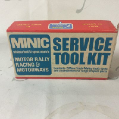 A collection of items including The Princess Diana International Stamp Collection 20th Anniversary Memorial Edition, a range of antique cars, a group of magazines related to cars and 2 toy racetracks