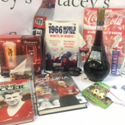 A Collection of various World Cup items including Bobby Charlton book of soccer, boxed beer glasses, Goal 98 bottled by Cevin Spa Pontedera Italy. This lot cannot be posted. NO RESERVE