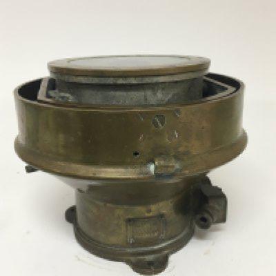 A Military gun metal or brass cased ships compass patt 0919 and numbered 1355 H. Diameter 24cm approximately. NO RESERVE