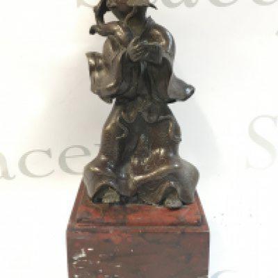 A late 19th century Japanese bronze figure on a marble base pedestal, 23cm tall.