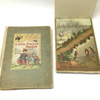 WITHDRAWN Two Christmas books including little french people by K J Fricero Postage B. NO RESERVE