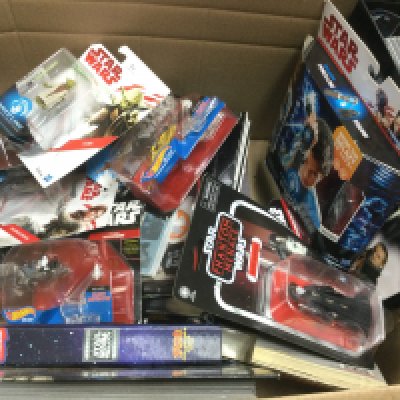 A box of Star Wars games, figures etc.