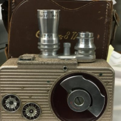 A collection of vintage cameras and equipment included. Includes a Cinemax 8 TA, a black Minolta camera with all equipment included, and 2 high quality lenses.