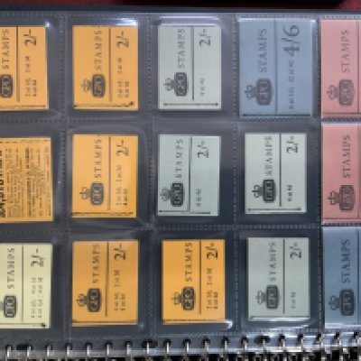 An album of complete postage stamp booklets. (B)