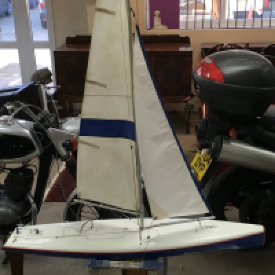 A pond yacht including a boxed Attack 2ER controller and sails. 142cm tall 124 cm long. NO RESERVE