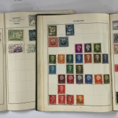 A collection of vintage stamp albums and loose stamps. NO RESERVE