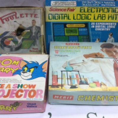 A collection of vintage board games including Crossfire, Skittle Bowl, Numbers Up and others.