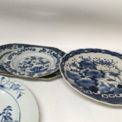 A collection of 18th Century Chinese Export porcelain blue and white porcelain and other similar blue and white ceramics some damage.