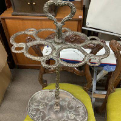 A vintage snake design umbrella/ stick stand.