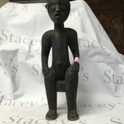 A vintage African wooden statue.