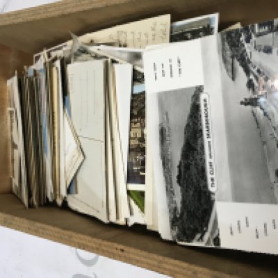 A Collection of vintage British postcards including locations,