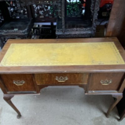 a vintage leather topped desk.