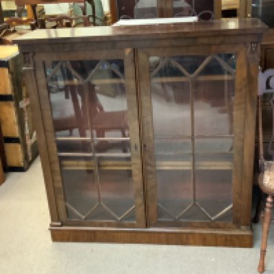 A Victorian Mahogany veneered bookcase. 111.5 x 113cm x 32cm
