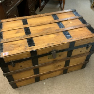 a large antique pine and metal bound trunk. 87cm x 49.5cm x 54cm