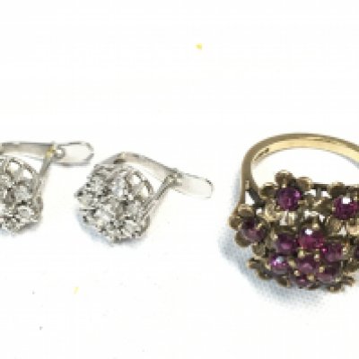 A pair of 9ct white gold illusion set diamond set clip earrings and a 9 carat gold ruby floral design ring. Total jewellery weight 7.33g