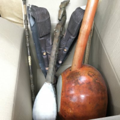 A Collection of tribal style instruments and masks