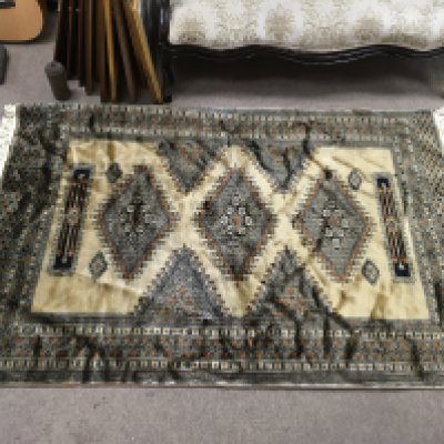 A silk rug from Pakistan , dimensions 182x124cm