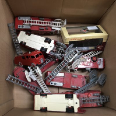 A collection of vintage Dinky Firetrucks.