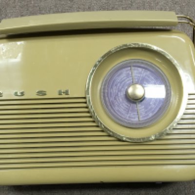 A collection of music related items including a traditional antique BUSH radio, a 4 valve portable receiver by Amplion, VINTAGE ORIGINAL ROBERTS R200 TRANSISTOR RADIO,