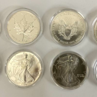 8 1 ounce silver proof coins. 2000/2001 Canada maple leaf, 93,94,95, 2000 Liberty Dollars, 2000 Brittania, 2000 Kookaburra.