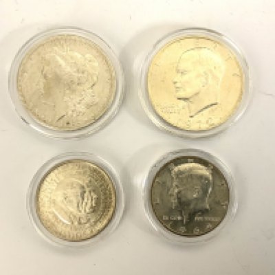 1883 American Dollar, 1972 Liberty Dollar, 1964 Liberty Half dollar, 1952 Washington-Carver Half Dollar.