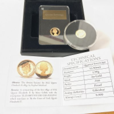 Two cased 1/4 sovereign coins, London mint issue. Postage category A