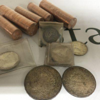 A collection of Early 20th Century Italian lire German Five mark commemorative coin French 1979 50 Franc and 1965 10 Franc coin and a quantity of uncirculated British decimal pennys and half pennys.
