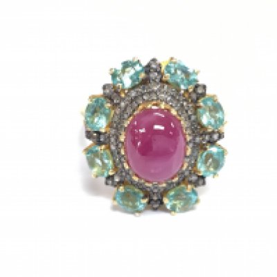 A cabochon ruby heat treated diamond and round green Apatite silver gilt dress ring. Ruby 2.80ct Apatite 3.50ct and Diamonds 0.65ct all approximate. Size P