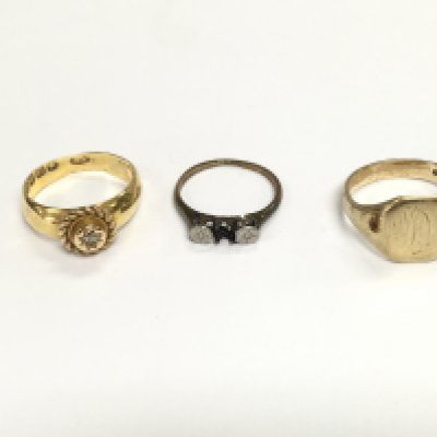 An 18ct gold ring 3.14g and two 9ct gold rings 5.29g