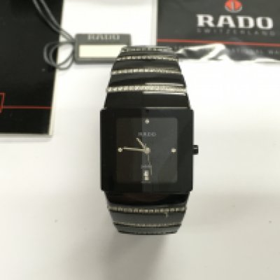 A Rado jubilee Diastar wrist watch with box and warranty card. Not seen running.