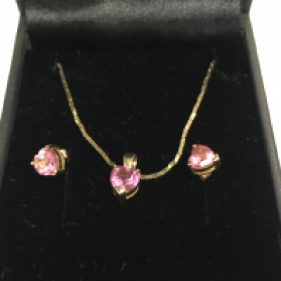 A pair of 9ct gold pink stone earrings and necklace with matching pink stone pendant. Postage B