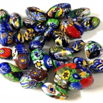 A group of Venetian glass beads. (A)