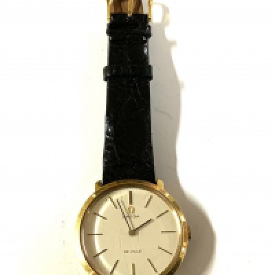 A vintage gold plated Omega wristwatch. seen working
