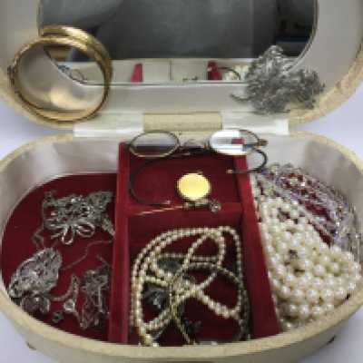 A collection of costume jewellery and pearl style jewellery including silver examples and a 9ct metal core bangle. Postage B