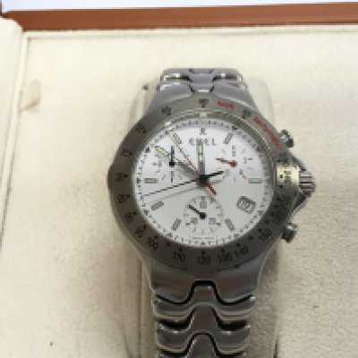 A gents Ebel wristwatch with box and additional link. Seen running. Postage B